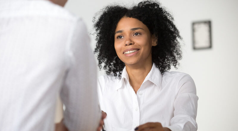 Smiling african hr interviewing job applicant, human resources