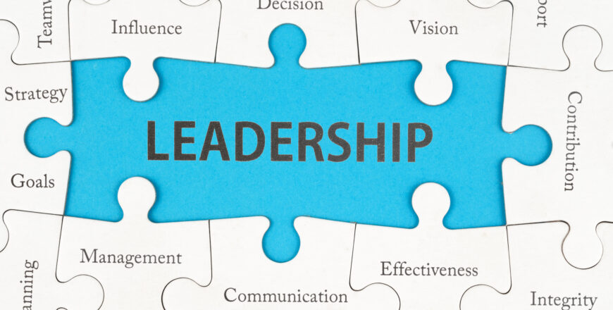 leadership concept with group of jigsaw puzzle pieces